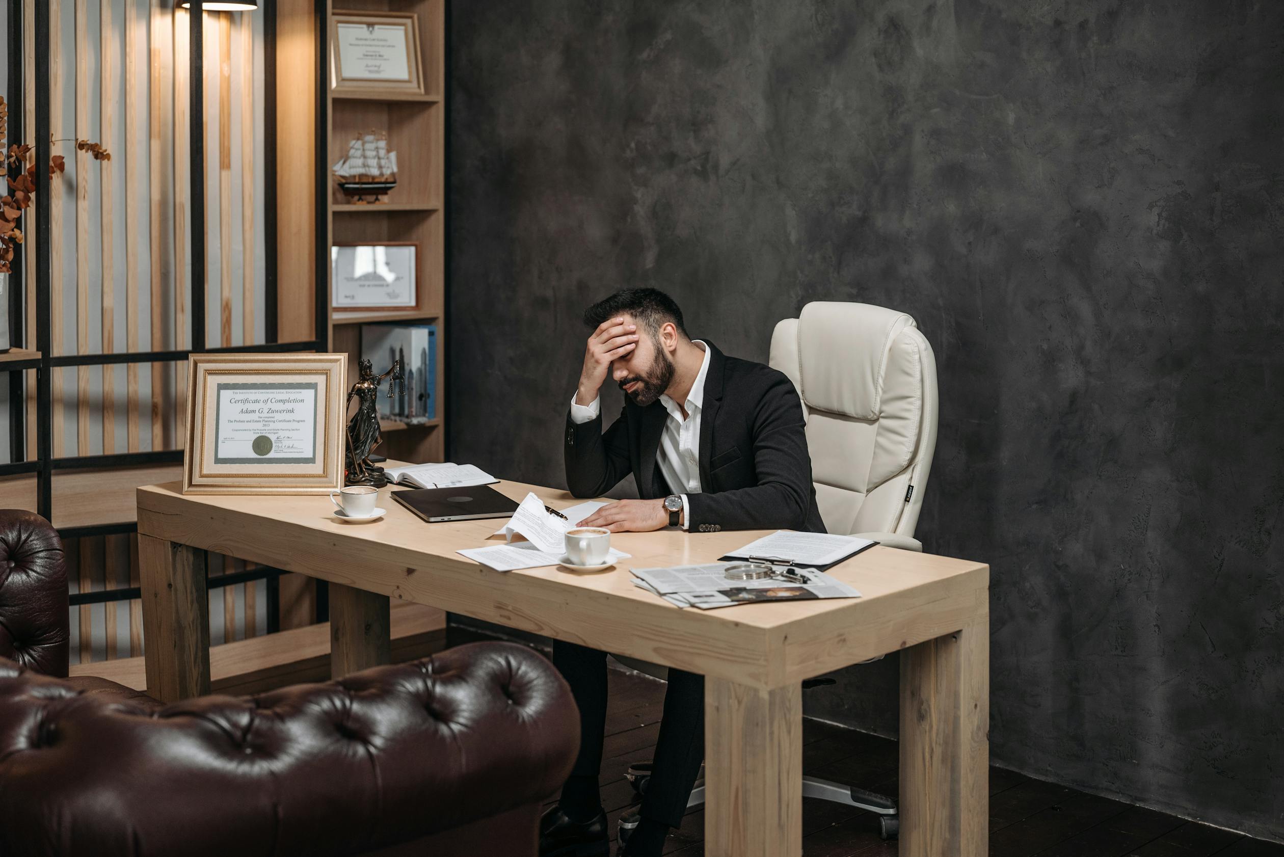 Business professional overwhelmed by manual processes